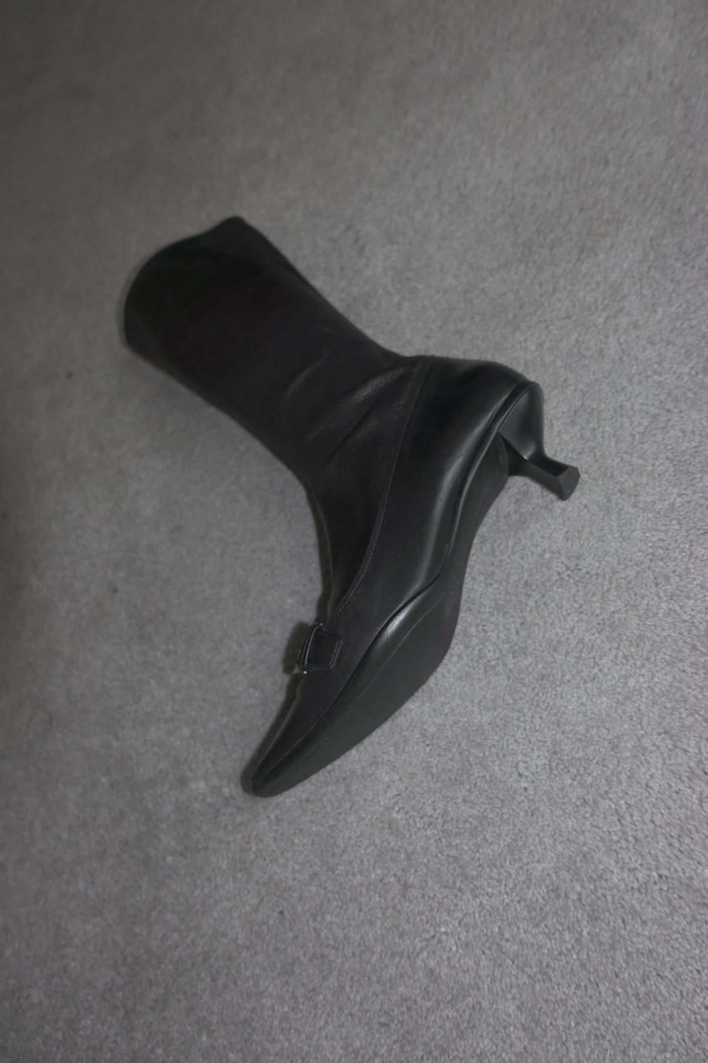 Prada pointed leather boots with buckles