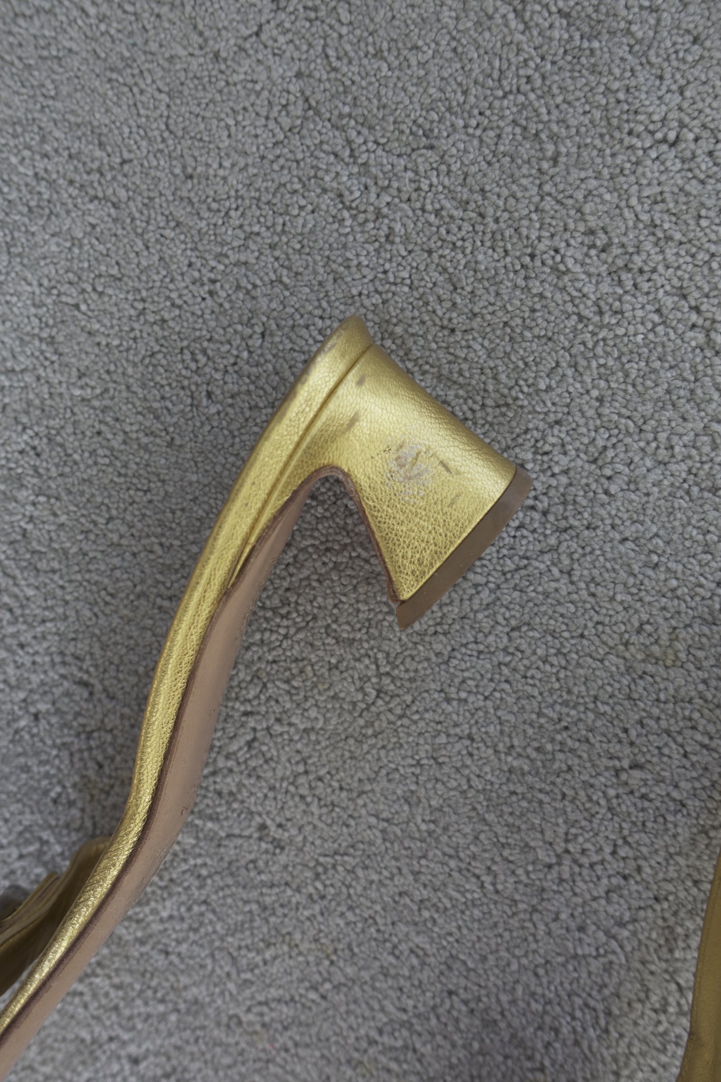 Prada gold buckle mules