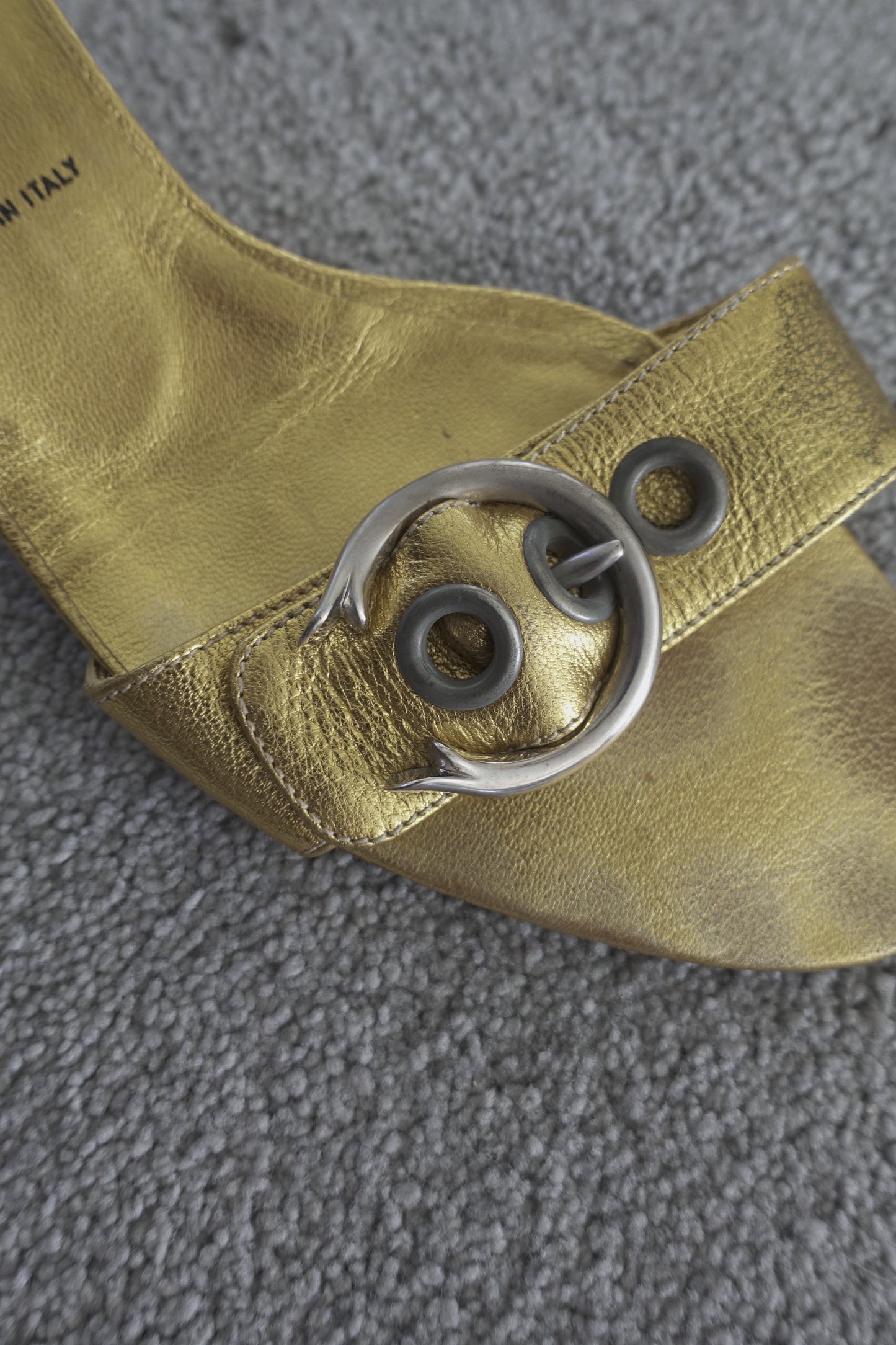 Prada gold buckle mules