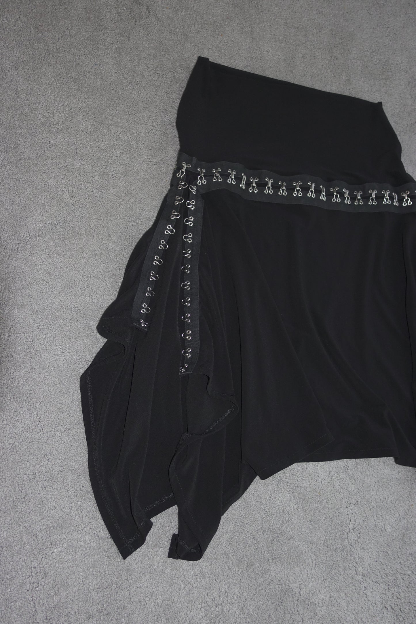 Asymmetrical skirt with hooks