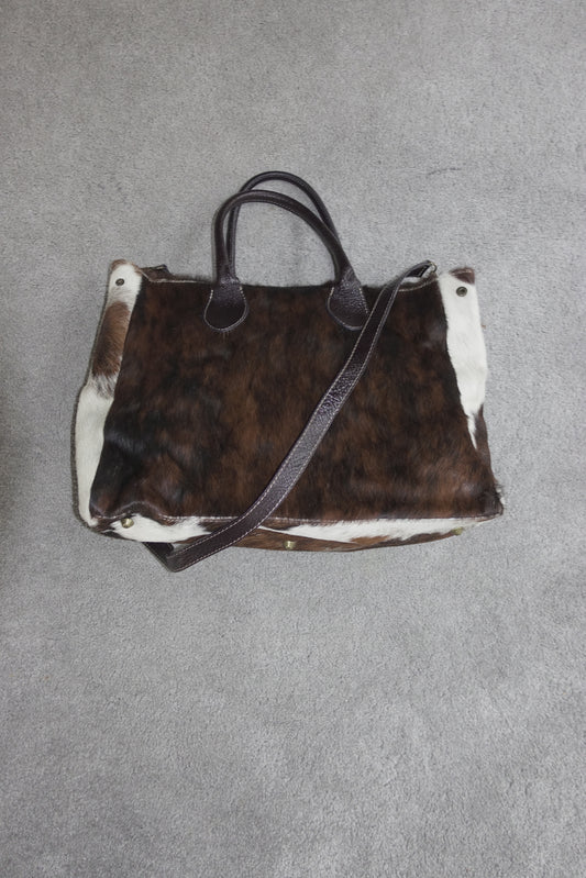 Cowhide- and leather bag