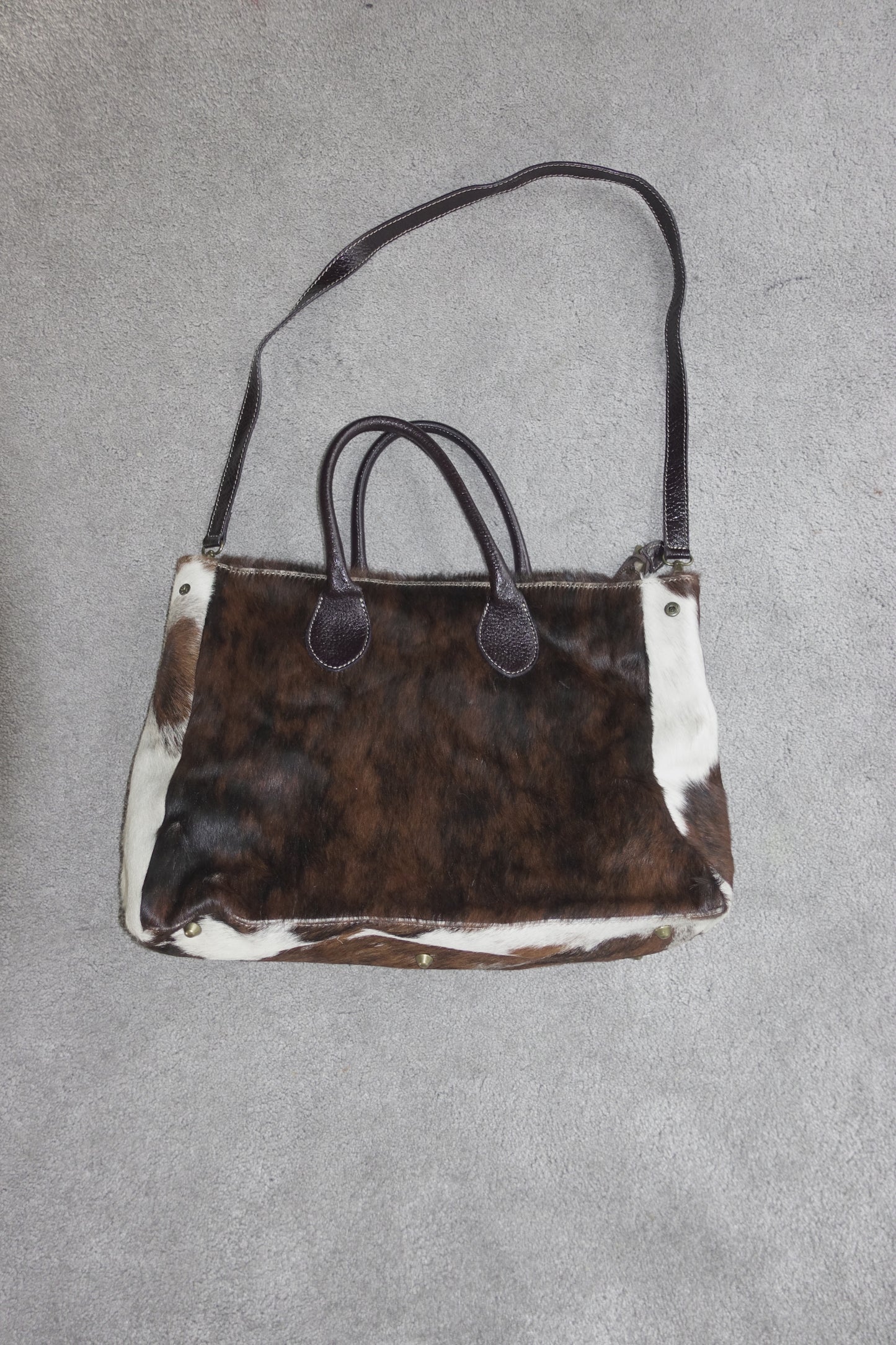 Cowhide- and leather bag